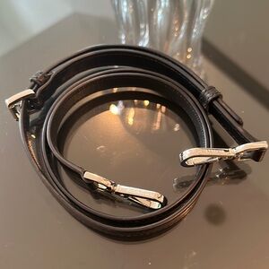 Michael Kors, purse strap can also be used as. A belt